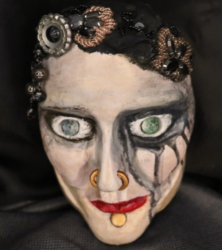 Psychosis Mask – Intimate Angle (Main Image) Close-up of lips and eyes with shadow play