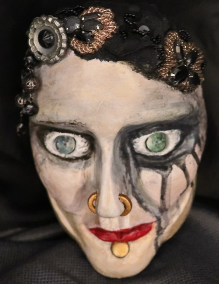 Close-up of lips and eyes with shadow play