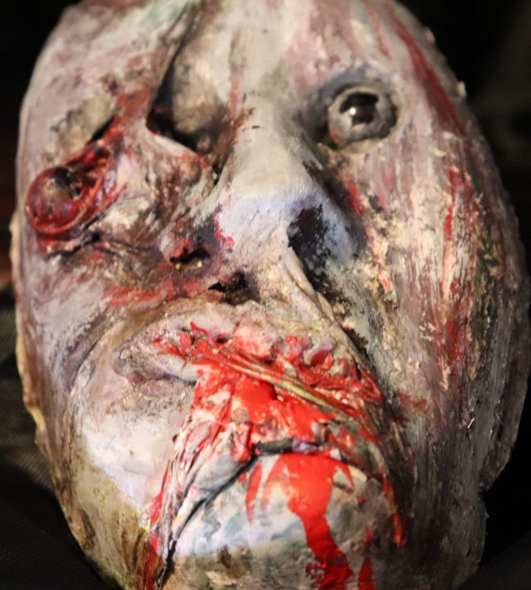 Face Eater Frontal portrait of the mask with dramatic expression